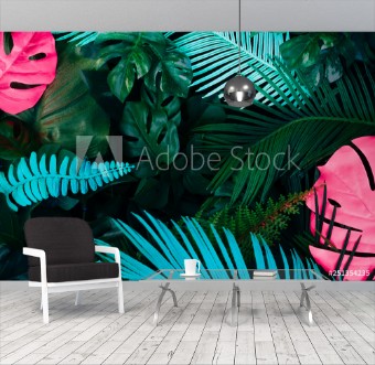 Picture of Creative fluorescent color layout made of tropical leaves Flat lay neon colors Nature concept